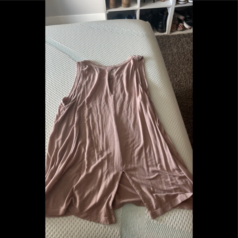 Rose pink tank top. Wore once to try once but lost rage.